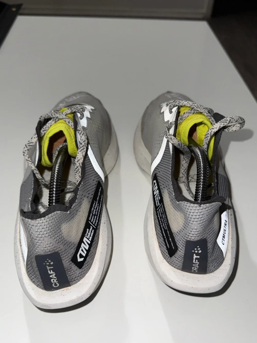 Craft Lightweight Neutral Gray Running Shoes with Bright Yellow Accents